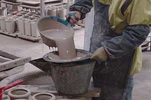 Slip cast technology for bonsai pot production - sieving the casting clay before watering the bonsai pots