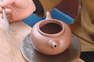 Yixing - la ville chinoise de la poterie - Faire une théière